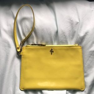 Cole Haan yellow patent leather wristlet